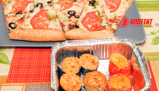 Сет из роллов «Тайфун» + горячая пицца на любой вкус от службы доставки «Аппетит». Скидка 50%