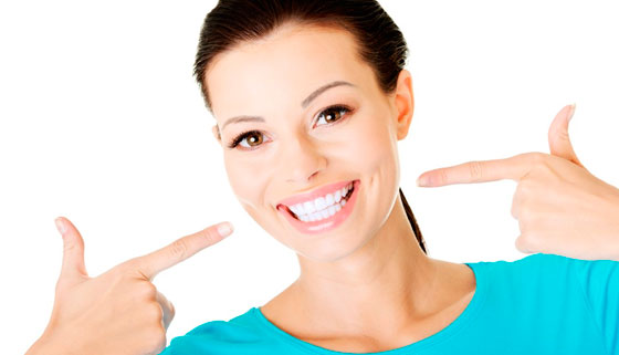 Лечение кариеса, чистка и отбеливание зубов, установка имплантата в стоматологической клинике Stomat-32. Скидка до 77%
