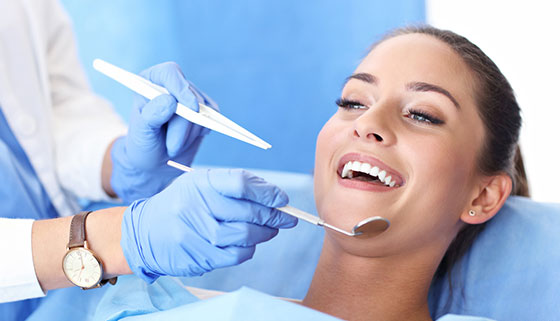 УЗ-чистка, лечение и простое удаление зубов в стоматологии S`Dental со скидкой до 52%