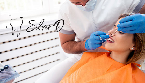 Скидка до 66% на ультразвуковую чистку с Air Flow и удаление зубов, лечение кариеса с установкой пломбы в стоматологии Silver D