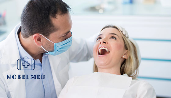 Скидка до 80% на чистку, лечение, протезирование и удаление зубов в стоматологической клинике Nobel Med